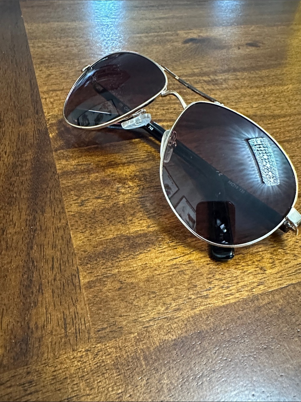 Gold toned sunglasses